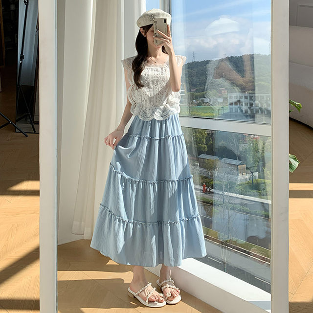 White skirt for women in spring and autumn 2025 new high-waisted slim A-line long skirt with small and fluffy cake skirt
