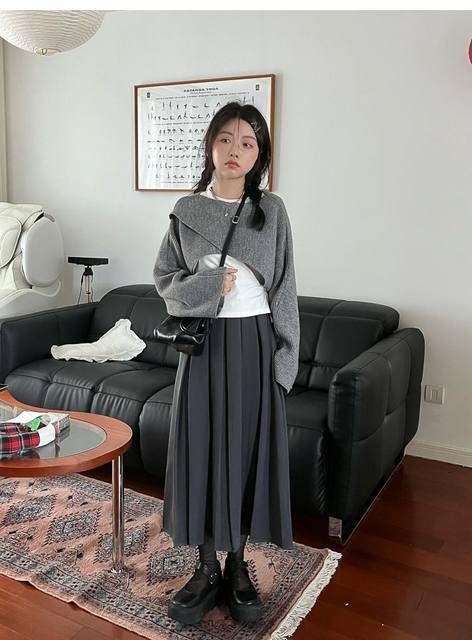 Western temperament high -level vertical pressure pleated suits skirt women autumn and winter retro, big cover leisure A -shaped half body long skirt

