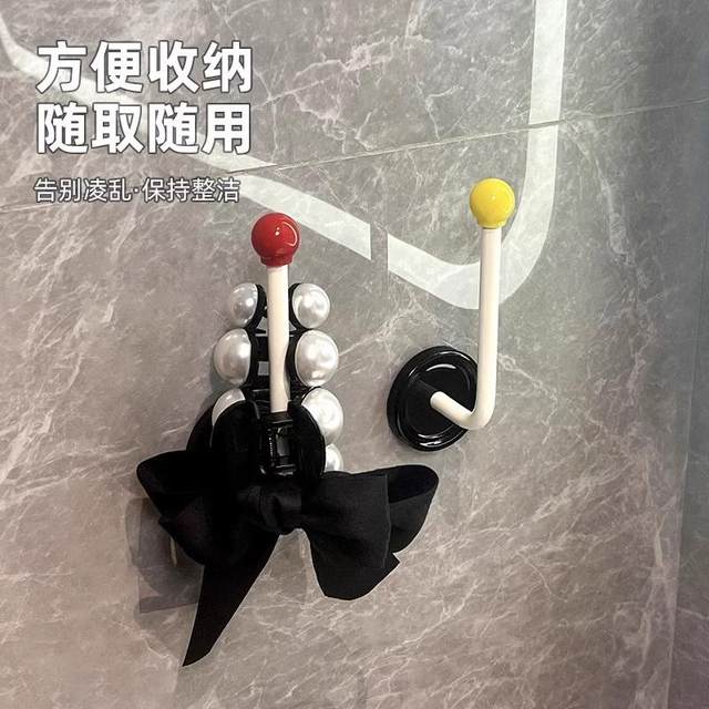 The bathroom hair hoop hair rope storage shelf wall new wall -mounted jewelry hair jewelry hair clip coat band head rope hook
