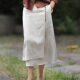 Solid color mid-length 2025 original hemp color literary irregular splicing skirt linen commuter slit A-line skirt summer