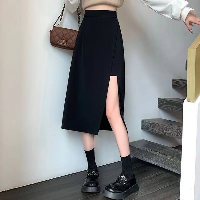 Pear-shaped body large size black fish bone skirt for women in spring and summer 2025 new fat mm waist-hugging a-line hip-packing umbrella skirt
