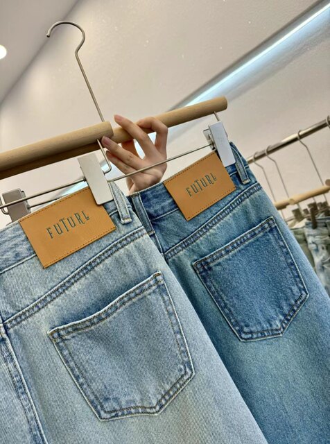 Rear slit retro mid-length 2025 spring and summer new high-waist denim skirt pure cotton texture is crisp and stylish
