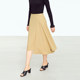Amii2025 summer new commuter solid color A-line skirt irregular tailoring medium length slightly elastic loose skirt for women