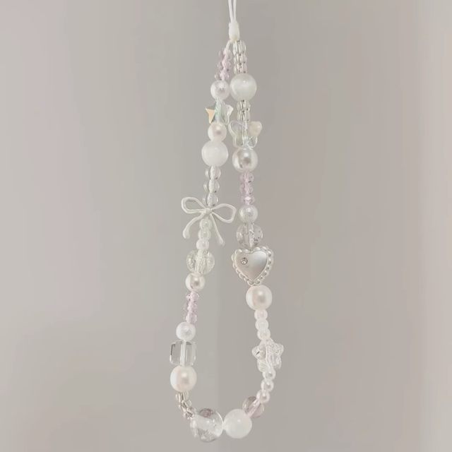 
Ballet style butterfly combined with gold love airpods headphone shell pendant chain ccd camera mobile phone lanyard to prevent loss