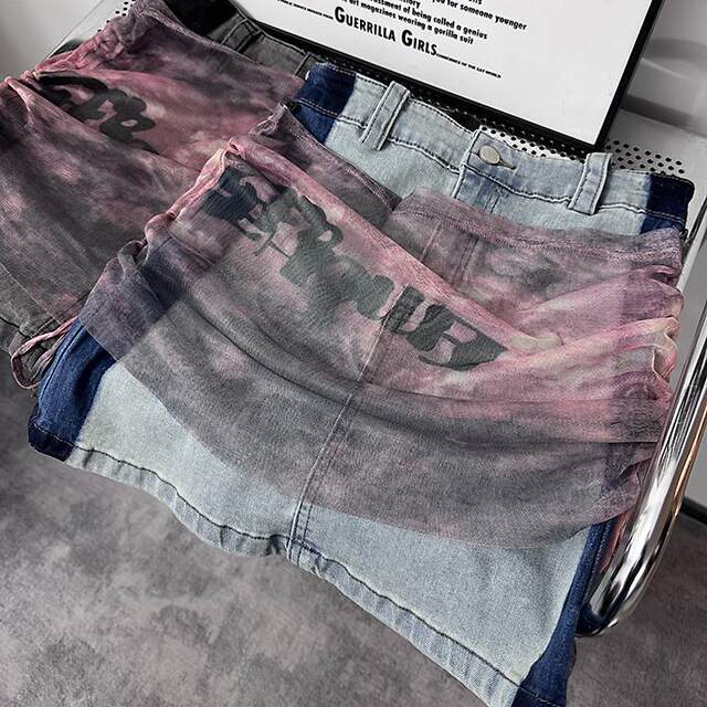 Design-sensible mesh splicing denim skirt for women in summer high-waisted A-line high-end hip-pack skirt skirt
