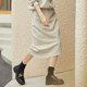 XG Xue Ge Commuting Simple Irregular Skirt Fashion Autumn New Slit Design High Waist Mid-Long Skirt Women's Clothing
