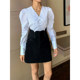 Xiaojingjia 2024 autumn and winter casual and fashionable solid color short skirt European and American street high waist A-line skirt small black skirt women