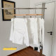 One-length neck off-shoulder temperament white shirt for women with waist-length slit hem design long-sleeved top
