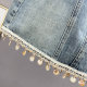 Retro old denim skirt women's short skirt 2025 summer new high-waisted slim tassel A-line hip skirt