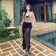 Swimsuit women's long -sleeved skirt -style Bikini four -piece shot shot from the seaside hot spring vacation large size slightly fat MM cover meat
