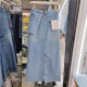 Korean design in summer is irregular, high waist A-line mid-length skirt with wash water and old slit denim skirt