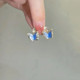 You can wear butterfly ear clips without ear piercings Six pairs of mosquito coil plate without ear piercings Niche flower asymmetry for women