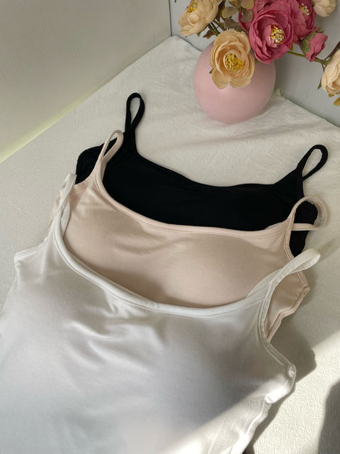 Sling pure slutty breasts in white and black with breast pads for women Modal shows big breasts and slim fit vest inner and sexy