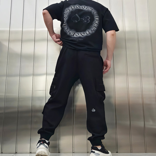 High street design trendy casual pants men's spring and summer loose foot ties sports trousers workwear pockets handsome functional style

