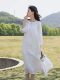 Literary retro white women's mid -length skirt new model seven -point sleeve pure color ramie crushing pleated loose large dressing dress