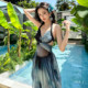 2025 new swimsuit women's high-end style body dress style bikini pure desire Sanya photo hot spring vacation swimsuit