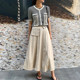 2025 spring and summer new high-waisted A-line skirt large size women's slim and versatile pocket workwear mid-length skirt