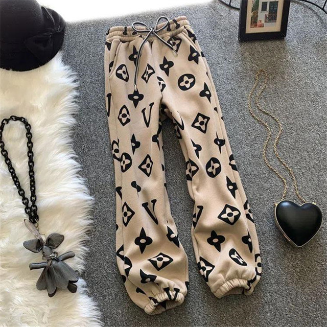 Clearance counter has withdrawn extra large size fat mm 300Jin [Jin is equal to 0.5kg] plus velvet and thickened printed wide-leg pants for women