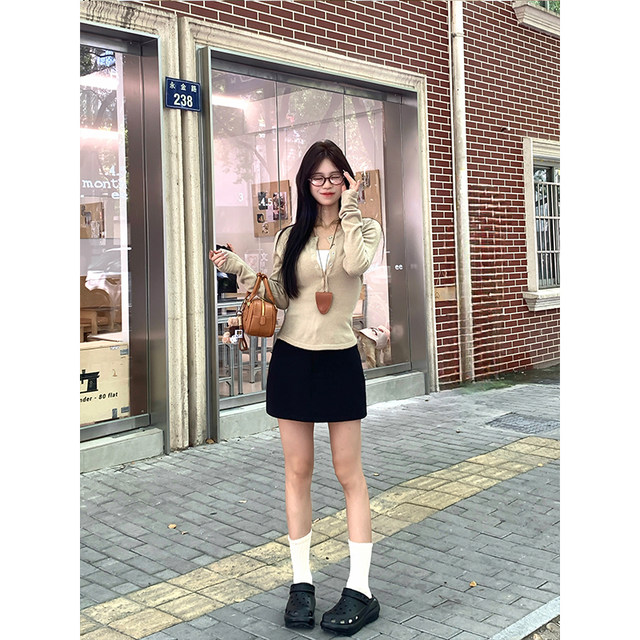 Adan versatile miu style skirt spring and autumn Korean style versatile high waist slim commuting black temperament A-line short skirt for women
