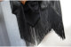 High-waisted hip mid skirt for women in autumn and winter fashion versatile simple irregular tassel slim skirt leather skirt