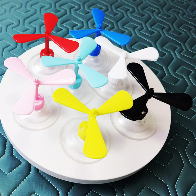Bamboo dragonfly hat suction cup sucking motorcycle toy, toys decorative windmill electric vehicle helmet small fan small fan rotation
