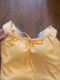 
Dopamine yellow white small suspender vest with chest pad pleated bow tie wide shoulder design beautiful back top