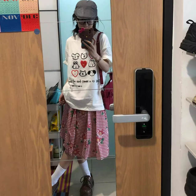Sweet and playful plaid pattern skirt for women in summer new elastic waist loose slim and versatile A-line mid-skirt for women

