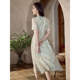 Inman French retro textured dress for women's summer new waist-hugging slim V-neck A-line floral skirt 18322554
