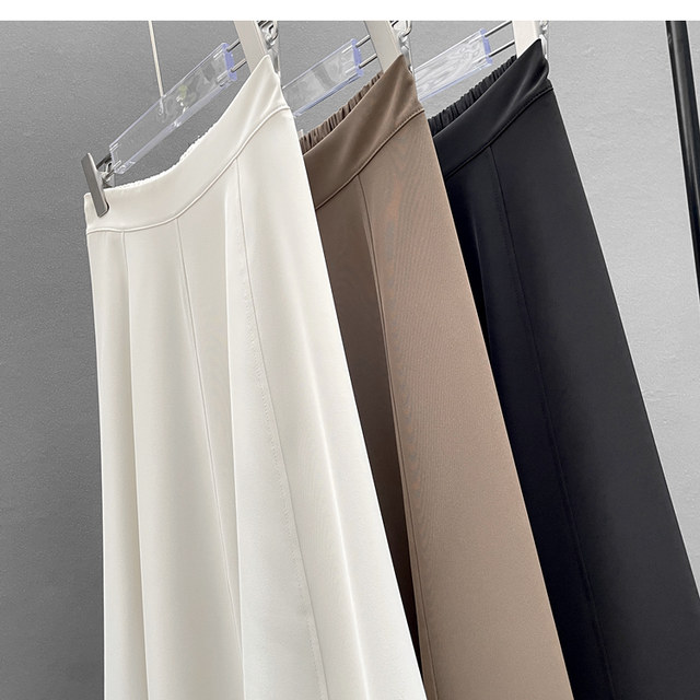 Spliced ​​skirt for women in spring and autumn zipper elastic large sway work temperament simple solid color umbrella skirt versatile midi skirt
