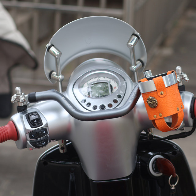 Suitable for motorcycle crossbar logo Django 150 coffee modified mobile phone holder extension rod multi-purpose child armrest