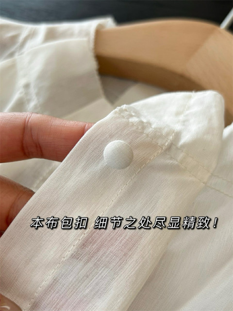 2025 spring and summer new product stand collar French long-sleeved temperament elegant and versatile single-breasted pure white flared sleeve shirt
