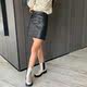 2024 half-height waist a-line skirt PU leather skirt commuter open line decoration large-size autumn and winter short skirt hot selling internet celebrity
