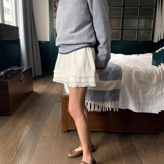 South Korea Dongdaemun Spring 2025 new sweet and fashionable lace-up high waist pleated lace skirt women's short skirt trendy
