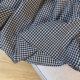Retro black and white plaid black earring skirt for women in summer irregular A-line thin casual high-waisted long skirt
