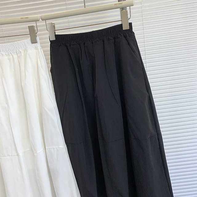 2024 Summer new loose waist cocoon large skirt puffy skirt medium long thin pocket leisure half skirt female