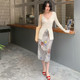 Jiuwu French retro 2025 spring and summer new straight-chip oil painting skirt mid-length high-waisted slim skirt