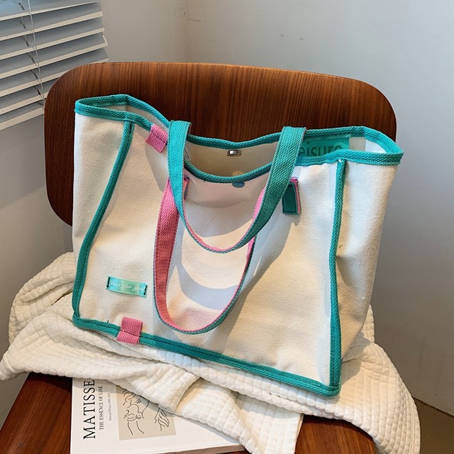 Large-capacity canvas women's bag 2025 new mommy mother and baby bag contrasting color portable tote bag class commuting shoulder bag