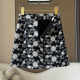 Black jacquard high-end fashion high-waisted skirt 2024 autumn and winter new women's printed commuter a-line short skirt trendy