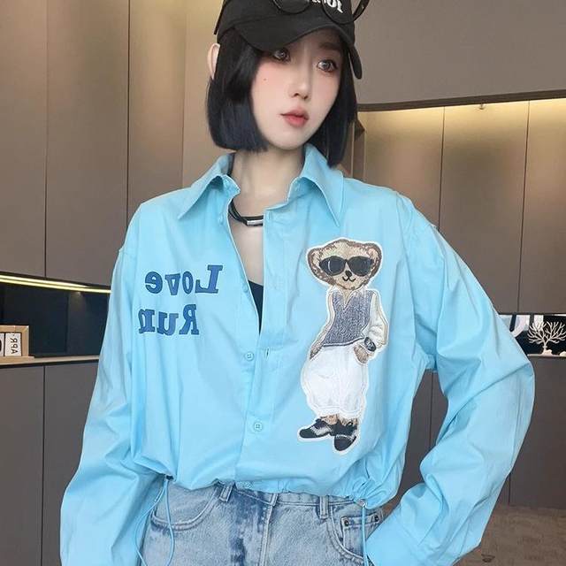 Long-sleeved shirt for women 2025 spring new contrasting color splicing cartoon cartoon letters loose single-breasted lapel top
