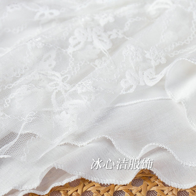 White irregular lace spliced ​​Organza skirt 2025 summer design niche slim midi skirt
