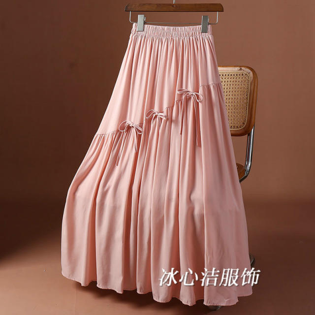 Bow irregular skirt 2025 spring and summer new high-waisted lace-up A-line skirt with wood ears mid-length skirt