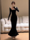 The lady's temperament is slim square collar and step-by-step lotus black long-sleeved dress for women with large size sexy knitted fishtail long skirt