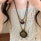 New Chinese Zen bronze feather necklace for women's bohemian ethnic style double layered long sweater chain accessories
