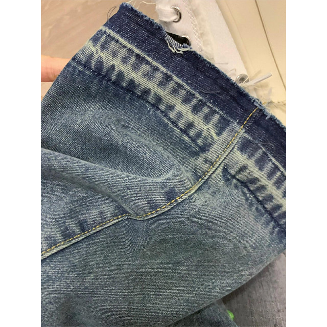 Fat mm large size women's cartoon jeans women's design feel embroidered pants fried street wild pants thin leg pants