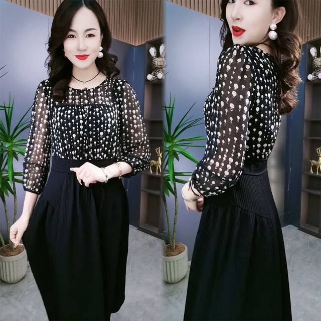 2025 early spring new style slim waist-hugging spliced ​​printed round neck mid-length skirt