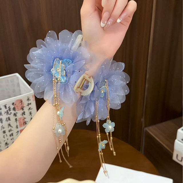 Summer tassel kiss flower butterfly clip 2025 new high-end blue flower hairpin hairpin for women on the back of the head