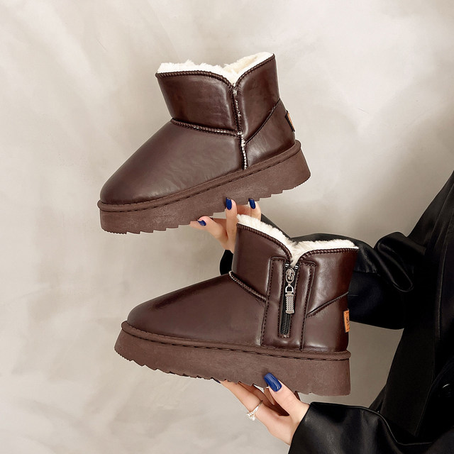 Northeast waterproof thick-soled fur all-in-one snow boots 2025 new women's winter plus velvet thickened anti-slip genuine leather cotton shoes