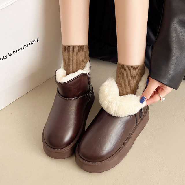 Northeast waterproof thick-soled fur all-in-one snow boots 2025 new women's winter plus velvet thickened anti-slip genuine leather cotton shoes