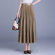 La Chapelle's new spring 2025 loose A-line mid-length over-knee pleated skirt for women