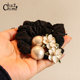 Chuzhimo camellia pearl hair rope 2025 new temperament sweet ball hair rope high appearance small intestine circle
